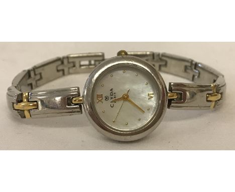 A ladies wristwatch by Clyda, Paris. Silver and gold tone bracelet with mother of pearl face.  