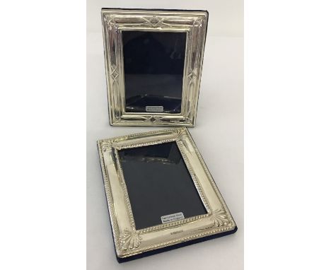 2 modern 925 silver photo frames, fully hallmarked to front. With blue baize back and stands (one stand missing). Both Hallma