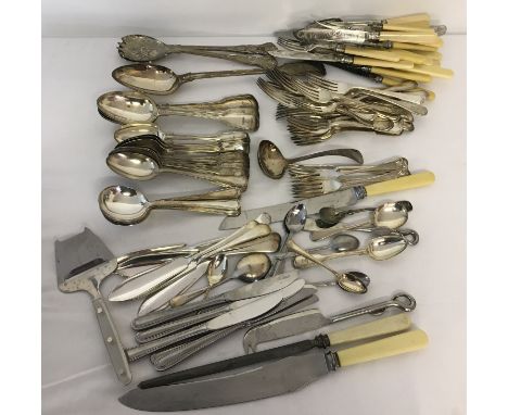 A collection of vintage silver plated cutlery. To include fish knives and forks, serving spoons and soup spoons. 