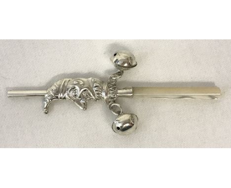 A 925 silver, pearl handled babies rattle in the shape of Mr. Punch. Whistle to one end and 2 small hanging bells. Approx. 11