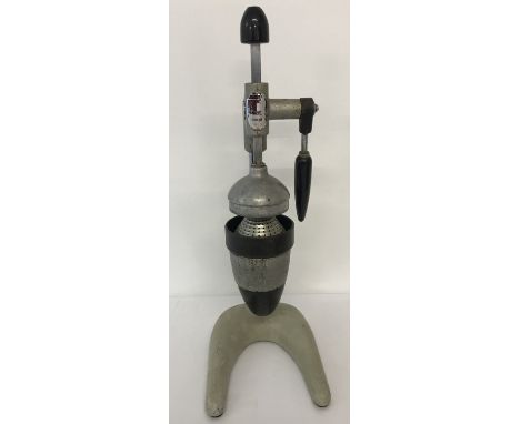 A vintage table top, Hamilton Beach Co lemon squeezer.  Approx. 54cm tall.