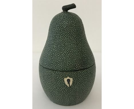 A Georgian style fruitwood tea caddy in the shape of a pear, complete with key.  Approx. 19cm tall.