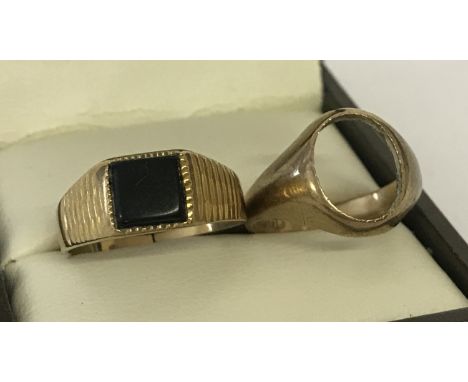 2 vintage 9ct gold signet rings suitable for scrap or repair. One set with square shaped onyx, band cut through, the other wi