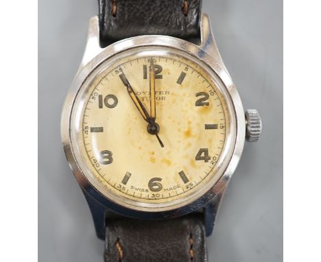 A gentleman's mid 20th century stainless steel Tudor Oyster manual wind wrist watch, with baton and Arabic dial, on later ass