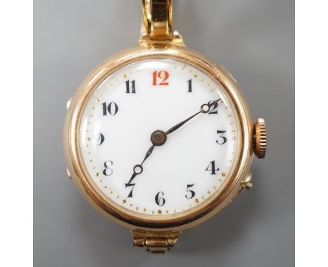A lady's George V 15ct gold lady's manual wind wrist watch, London, 1918, on a 15ct flexible bracelet, gross weight 24.7 gram