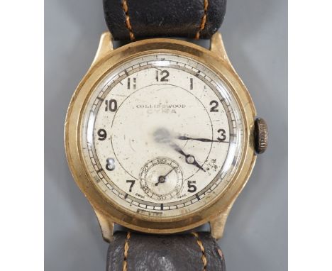 A gentleman's mid 20th century 9ct gold Cyma manual wind wrist watch, retailed by Collingwood, on associated? leather strap, 