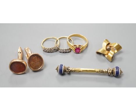 A group of mixed jewellery including two 18ct and diamond half hoop rings, a pair of Middle Eastern yellow metal and talisman