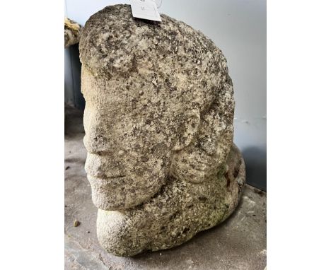 A carved stone corbel, height 40cm