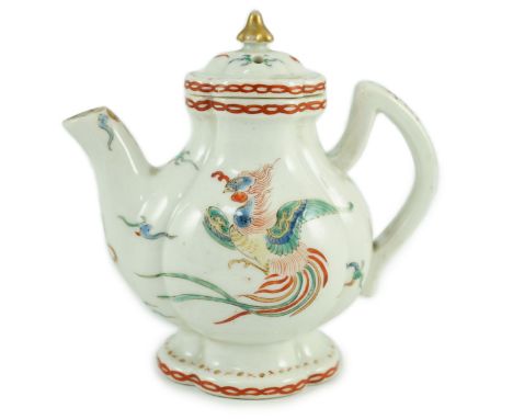 A small Japanese Arita kakiemon style water or teapot, possibly Edo period,11 cms high, painted with a phoenix, the reserve w