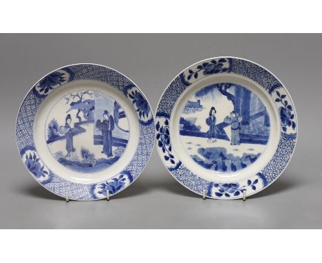 Two Chinese blue and white plates, Kangxi period, one with Kangxi mark the other a Chenghua mark,21 cms diameter,