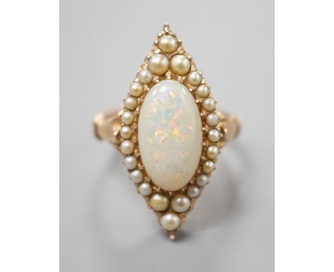 A yellow meat, white opal and seed pearl set marquise shaped cluster ring, size J/K, gross weight 5.6 grams.