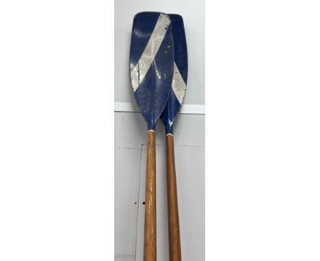 A pair of vintage wooden oars with painted blades, length 298cm