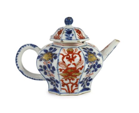 A small Chinese Imari octagonal teapot, Kangxi period,10 cms high, painted with alternating panels of flowers and foliage, 10