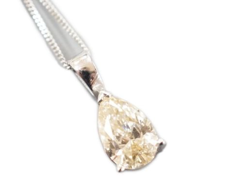 A modern white metal and light brown pear cut diamond set pendant, 14mm, on an 18ct white gold fine link chain, 45cm, the dia