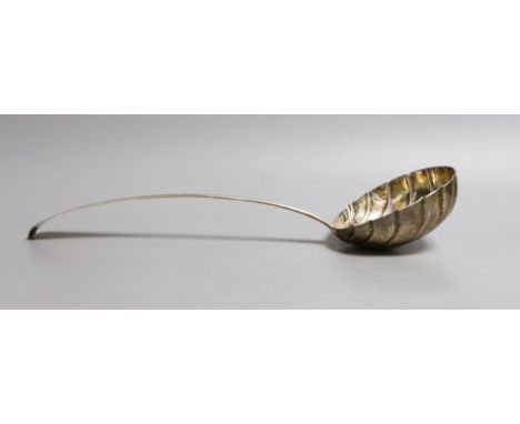 A George IV Irish engraved silver soup ladle, with fluted bowl, Charles Marsh, Dublin, 1826, 34.6cm, 187 grams.