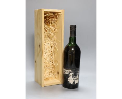 A cased bottle of Cockburns 1970 vintage port.