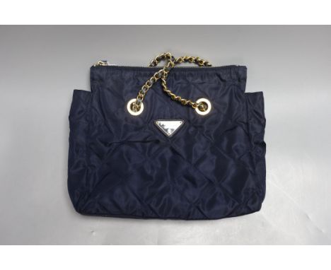A vintage Prada nylon quilted shoulder bag with blue Prada Certificate of Authenticity, 30cm wide