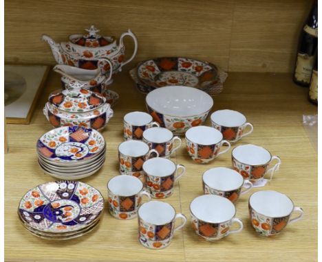 A 19th century English porcelain part tea and coffee set, probably Coalport and a similar Wedgwood part set