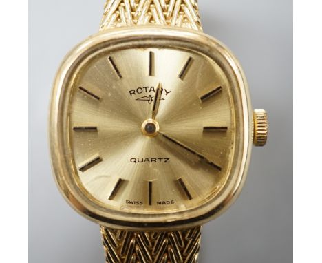 A lady's modern 9ct gold Rotary quartz wrist watch, on a 9ct gold bracelet, gross weight 30.3 grams.