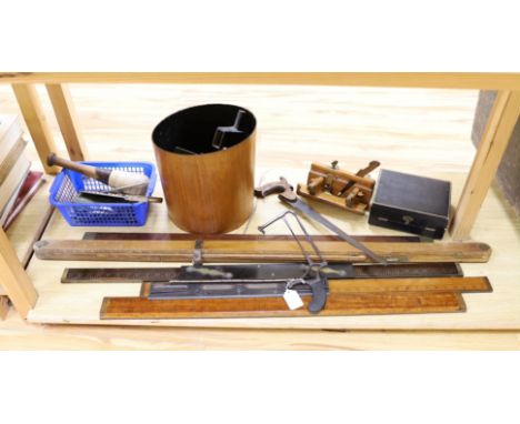 A leather writing box, a collection of wooden rulers, a small collection of wood working and surgeon’s tools etc,