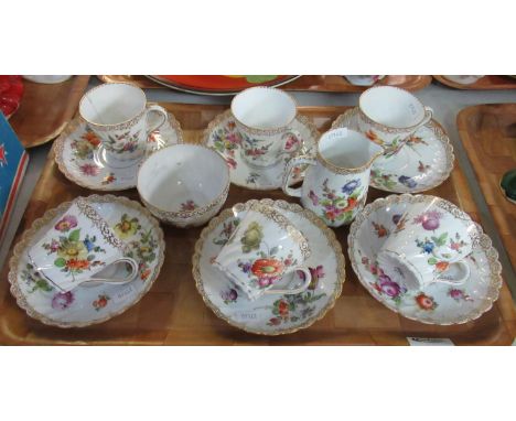 Dresden porcelain part tea service on a white ground with floral sprays, to include six cups and saucers, cream jug, and suga