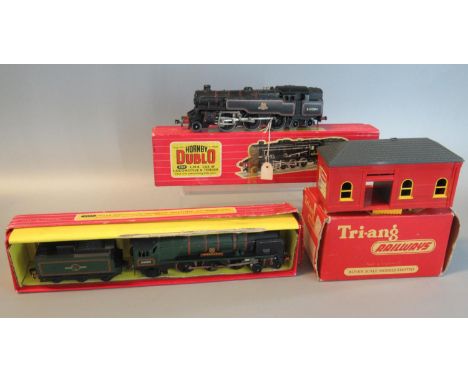 Hornby Dublo 22224 LMR locomotive and tender in original box. Together with another Hornby Dublo 2235 West Country locomotive