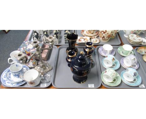 Three trays of assorted china to include: one tray of Wedgwood 'Millennium' cups and saucers, two green, two purple, and two 