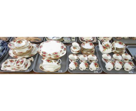 Four trays of Royal Albert 'Old Country Roses' tea and dinnerware to include: twelve teacups and saucers, thirteen tea plates