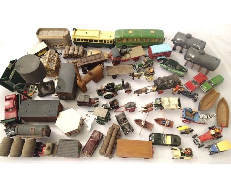 Selection of OO scale model railway accessories, cars, vans, buses, horse drawn, water tanks, oil tanks etc all ex layout. P&