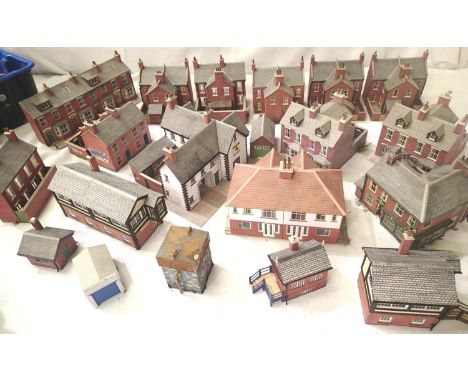 Twenty OO scale built card buildings including low relief, mostly in very good - excellent condition, ex layout. P&amp;P Grou