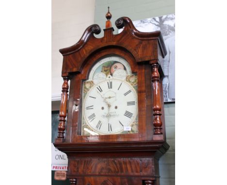 An early Victorian mahogany long case clock of large proportions, the painted arch dial with moon roller and 8 day movement, 