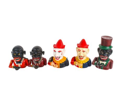 Five vintage cast iron money boxes. Of various designs, including two clowns and a figure wearing a hat, largest H20cm