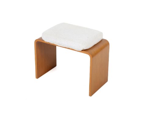 A vintage novelty footstool. The curved wooden frame upholstered with a sheepskin seat, H48cm x W57.5cm x D31cm