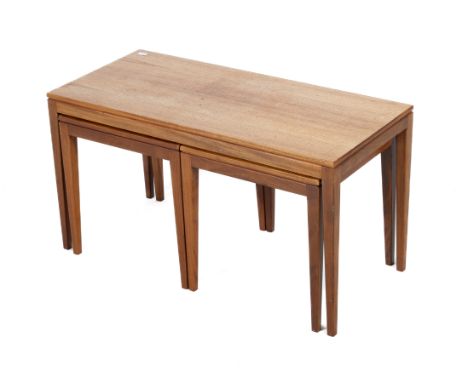A vintage nest of table and a teak standard lamp. The tables comprising one narrow rectangle and two square tables beneath, l
