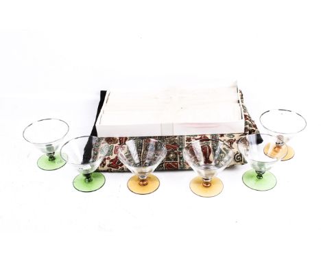 An assortment of mid-century items. Comprising a set of six dessert glasses, with green or orange feet, H9cm, a boxed set of 