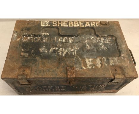 A Metal travel trunk, marked Lt. Sebbeare and dated 1942. Painted marks to front, "Nearest Station Banbury G.W.R." 