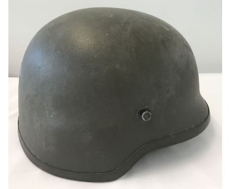 A Norwegian Army AVC kevlar helmet, Schuberth M826. With interior lining and chin strap. Size Extra large. From a private col