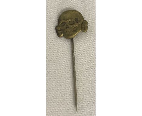 A WWII style Waffen SS Totenkopf skull lapel pin.  