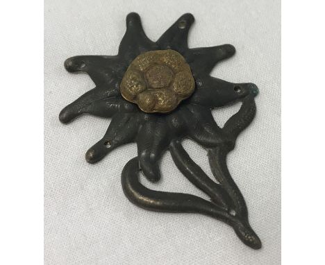 A German WWII style Gebirgsjagers (Light Infantry Alpine Troops) Edelweiss badge.  