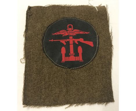 WWII style Royal Marine Comando Combined Ops patch on uniform fragment.  Total size approx. 14cm x 11.5cm.