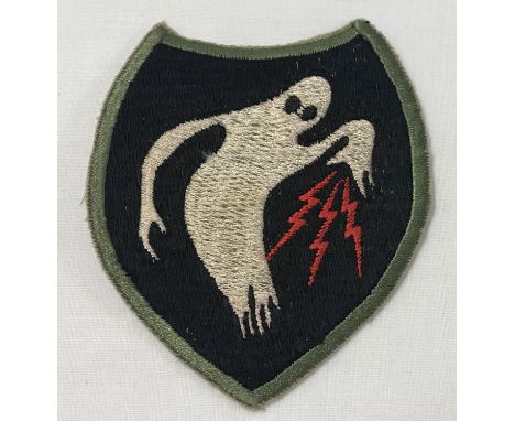 A WWII style US 23rd HQ Special Troops (Ghost Army) cloth patch.  