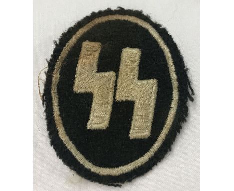 A German WWII style Waffen SS Women's uniform patch.  Approx. 6.5cm long.
