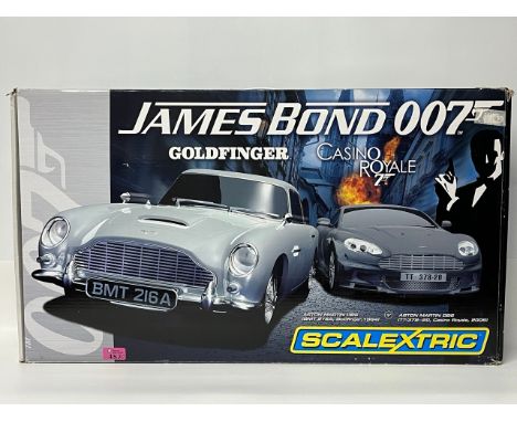 Scalextric James Bond 007 C1254 Goldfinger Casino Royale(5200g)Previously enjoyed, appears complete (perhaps half-straight mi