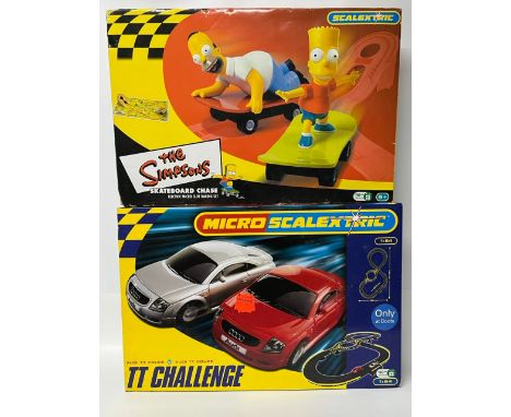 Two Micro Scalextric sets 'The Simpsons' and 'TT Challenge', Appearing complete(4400g)TT Challenge set appears new and un-use