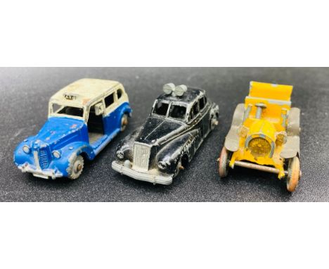 Dinky Police Car No.5, Dinky Austin Taxi & Charbens Car. All showing signs of age. (3)Dinky No. 5 Wolsley Six-Eighty Police C