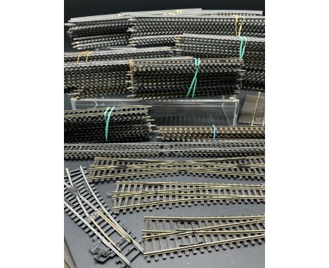 Job lot of OO gauge track, various manufacturers including Hornby (Austria) and Lima(2200g)Estimated 70+ itemsMany missing fi