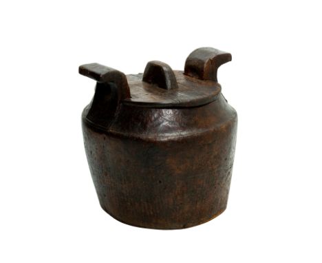 A VERY LARGE BATAK CARVED WOOD 'RUMBI' RICE CONTAINER
Toba-Batak, Sumatra, Indonesia, the large vessel hollowed from a single