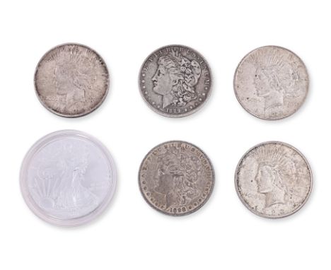 UNITED STATES COINS - A GROUP OF SIX SILVER DOLLARS
Comprising:
2011, American Silver Eagle;
1889 O Morgan Dollar;
1898 Morga