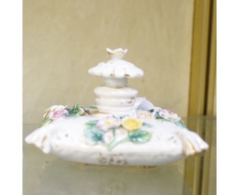 A Meissen model of a flower-encrusted scent bottle and stopper, late 19th century, blue crossed swords mark, 6cm high. Chip t