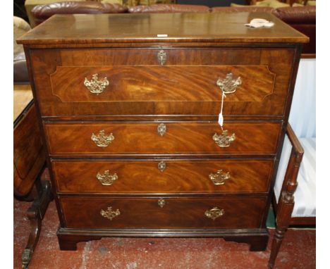 A George III mahogany and inlaid secretaire chest, circa 1800, the secretaire drawer with hinged fall front opening to a baiz